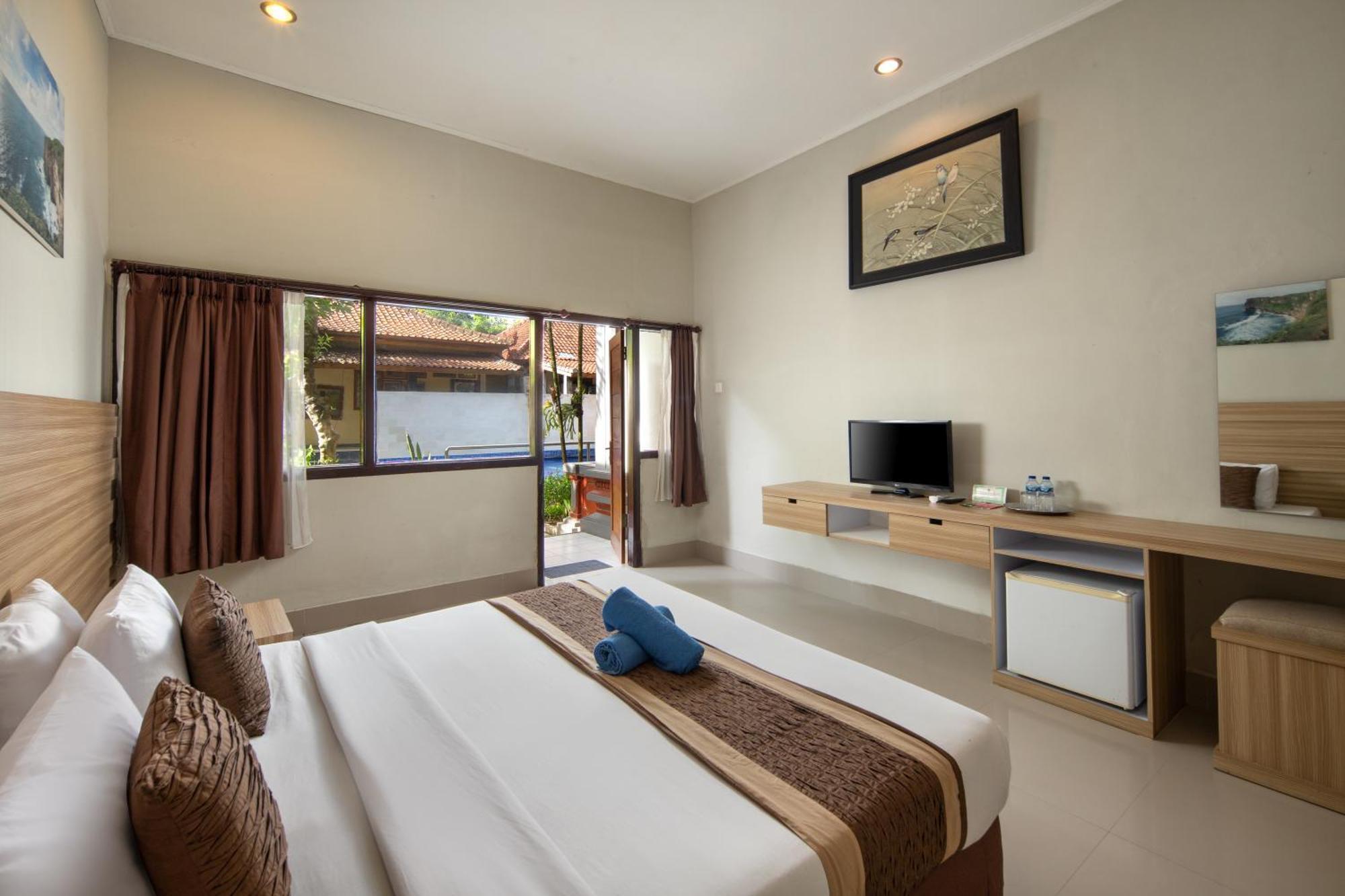 เลเกียน วิลเลจ บีช รีสอร์ต Hotel เลอกีอัน ห้อง รูปภาพ